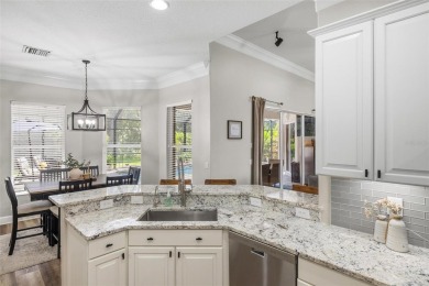 Stunning Pool Home with $200K in Thoughtful Upgrades in Gated on Stoneybrook Golf Club At Heritage Harbour in Florida - for sale on GolfHomes.com, golf home, golf lot