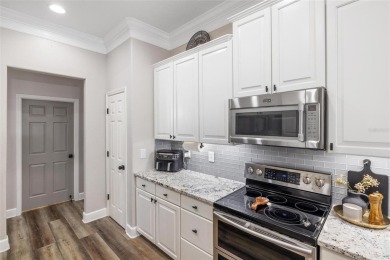 Stunning Pool Home with $200K in Thoughtful Upgrades in Gated on Stoneybrook Golf Club At Heritage Harbour in Florida - for sale on GolfHomes.com, golf home, golf lot
