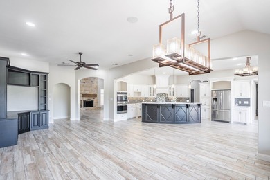 Stunning 4 bed, 3 bath home on the golf course with sweeping on Green Tree Country Club in Texas - for sale on GolfHomes.com, golf home, golf lot