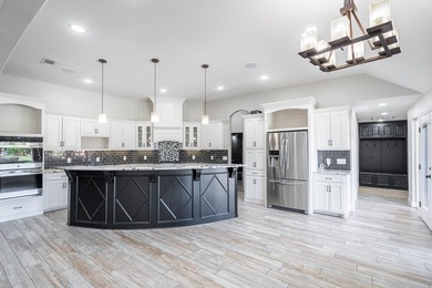 Stunning 4 bed, 3 bath home on the golf course with sweeping on Green Tree Country Club in Texas - for sale on GolfHomes.com, golf home, golf lot