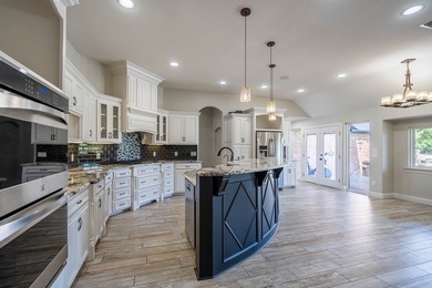 Stunning 4 bed, 3 bath home on the golf course with sweeping on Green Tree Country Club in Texas - for sale on GolfHomes.com, golf home, golf lot