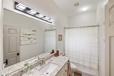 Stunning Pool Home with $200K in Thoughtful Upgrades in Gated on Stoneybrook Golf Club At Heritage Harbour in Florida - for sale on GolfHomes.com, golf home, golf lot