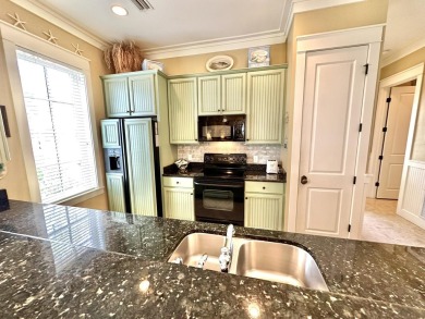 This charming four-bedroom beach cottage located in The Bungalos on Sandestin Golf and Beach Resort - Raven in Florida - for sale on GolfHomes.com, golf home, golf lot