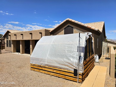 Live Lavishly on the Links! This custom-built masterpiece sits on Valle Vista Golf Course in Arizona - for sale on GolfHomes.com, golf home, golf lot