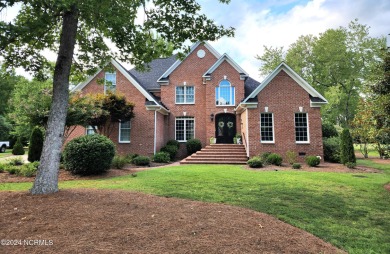 Discover this stunning all-brick home in the prestigious Cypress on Cypress Landing Golf Club in North Carolina - for sale on GolfHomes.com, golf home, golf lot