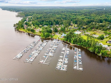 Discover this stunning all-brick home in the prestigious Cypress on Cypress Landing Golf Club in North Carolina - for sale on GolfHomes.com, golf home, golf lot