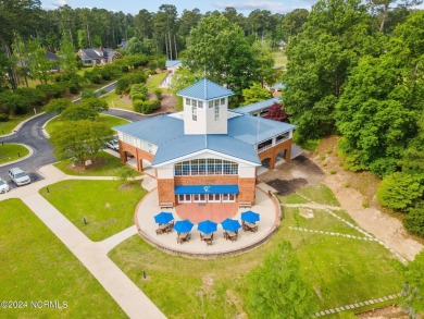 Discover this stunning all-brick home in the prestigious Cypress on Cypress Landing Golf Club in North Carolina - for sale on GolfHomes.com, golf home, golf lot