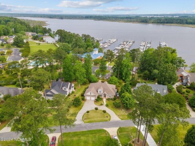 Discover this stunning all-brick home in the prestigious Cypress on Cypress Landing Golf Club in North Carolina - for sale on GolfHomes.com, golf home, golf lot