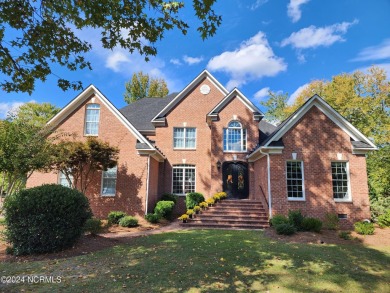 Discover this stunning all-brick home in the prestigious Cypress on Cypress Landing Golf Club in North Carolina - for sale on GolfHomes.com, golf home, golf lot