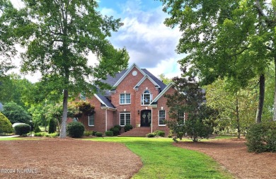 Discover this stunning all-brick home in the prestigious Cypress on Cypress Landing Golf Club in North Carolina - for sale on GolfHomes.com, golf home, golf lot