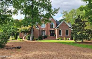 Discover this stunning all-brick home in the prestigious Cypress on Cypress Landing Golf Club in North Carolina - for sale on GolfHomes.com, golf home, golf lot