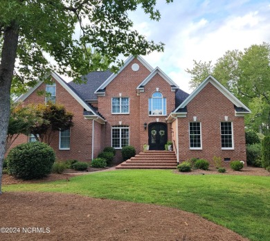 Discover this stunning all-brick home in the prestigious Cypress on Cypress Landing Golf Club in North Carolina - for sale on GolfHomes.com, golf home, golf lot