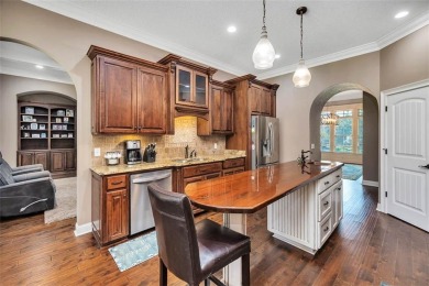 Experience the pinnacle of Oak Grove Island living with this on Oak Grove Island Golf and Country Club in Georgia - for sale on GolfHomes.com, golf home, golf lot