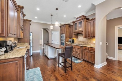Experience the pinnacle of Oak Grove Island living with this on Oak Grove Island Golf and Country Club in Georgia - for sale on GolfHomes.com, golf home, golf lot