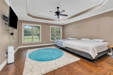 Experience the pinnacle of Oak Grove Island living with this on Oak Grove Island Golf and Country Club in Georgia - for sale on GolfHomes.com, golf home, golf lot