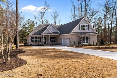 Settle into the ease of coastal living with this thoughtfully on River Landing Golf Course in North Carolina - for sale on GolfHomes.com, golf home, golf lot