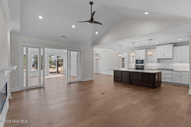 Settle into the ease of coastal living with this thoughtfully on River Landing Golf Course in North Carolina - for sale on GolfHomes.com, golf home, golf lot