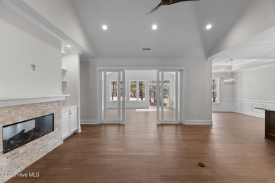 Settle into the ease of coastal living with this thoughtfully on River Landing Golf Course in North Carolina - for sale on GolfHomes.com, golf home, golf lot