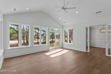 Settle into the ease of coastal living with this thoughtfully on River Landing Golf Course in North Carolina - for sale on GolfHomes.com, golf home, golf lot