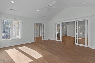 Settle into the ease of coastal living with this thoughtfully on River Landing Golf Course in North Carolina - for sale on GolfHomes.com, golf home, golf lot