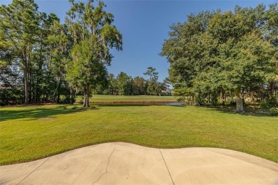 Experience the pinnacle of Oak Grove Island living with this on Oak Grove Island Golf and Country Club in Georgia - for sale on GolfHomes.com, golf home, golf lot