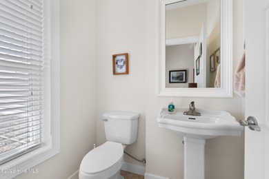 This extremely well-kept townhouse in the amenity-rich community on Brunswick Plantation and Golf Resorts in North Carolina - for sale on GolfHomes.com, golf home, golf lot