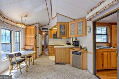 Looking for an affordable getaway? Check out this unique on Mountain Harbour Golf Club in North Carolina - for sale on GolfHomes.com, golf home, golf lot