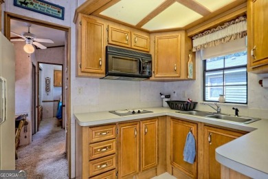 Looking for an affordable getaway? Check out this unique on Mountain Harbour Golf Club in North Carolina - for sale on GolfHomes.com, golf home, golf lot