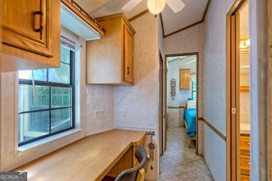 Looking for an affordable getaway? Check out this unique on Mountain Harbour Golf Club in North Carolina - for sale on GolfHomes.com, golf home, golf lot