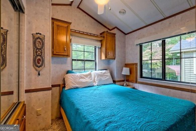 Looking for an affordable getaway? Check out this unique on Mountain Harbour Golf Club in North Carolina - for sale on GolfHomes.com, golf home, golf lot
