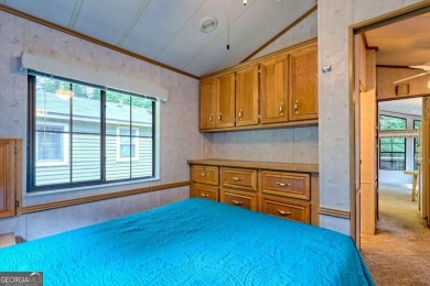 Looking for an affordable getaway? Check out this unique on Mountain Harbour Golf Club in North Carolina - for sale on GolfHomes.com, golf home, golf lot