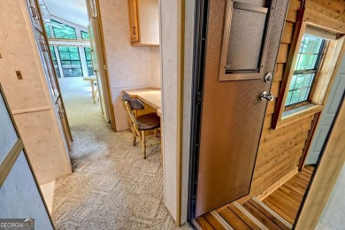 Looking for an affordable getaway? Check out this unique on Mountain Harbour Golf Club in North Carolina - for sale on GolfHomes.com, golf home, golf lot