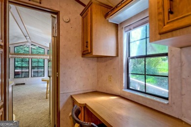 Looking for an affordable getaway? Check out this unique on Mountain Harbour Golf Club in North Carolina - for sale on GolfHomes.com, golf home, golf lot