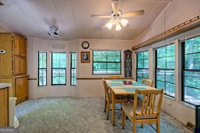 Looking for an affordable getaway? Check out this unique on Mountain Harbour Golf Club in North Carolina - for sale on GolfHomes.com, golf home, golf lot