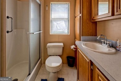 Looking for an affordable getaway? Check out this unique on Mountain Harbour Golf Club in North Carolina - for sale on GolfHomes.com, golf home, golf lot