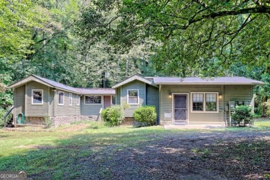 Looking for an affordable getaway? Check out this unique on Mountain Harbour Golf Club in North Carolina - for sale on GolfHomes.com, golf home, golf lot