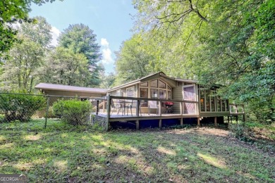 Looking for an affordable getaway? Check out this unique on Mountain Harbour Golf Club in North Carolina - for sale on GolfHomes.com, golf home, golf lot