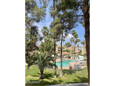 Location! Location! Balcony views of the pool and center on Westbrook Village Golf Club in Arizona - for sale on GolfHomes.com, golf home, golf lot