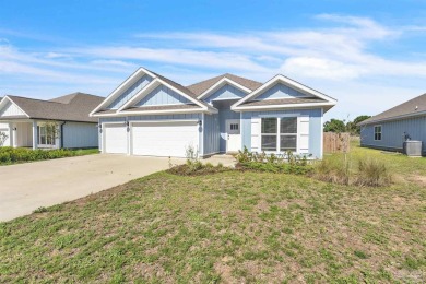 This beautifully designed 4-bedroom, 3-bathroom home with a on Tiger Point Golf and Country Club in Florida - for sale on GolfHomes.com, golf home, golf lot