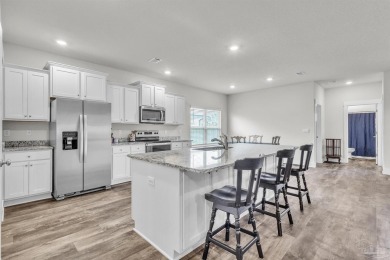 This beautifully designed 4-bedroom, 3-bathroom home with a on Tiger Point Golf and Country Club in Florida - for sale on GolfHomes.com, golf home, golf lot