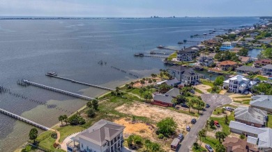 Experience Gulf Coast living on this beautiful sound front lot on Tiger Point Golf and Country Club in Florida - for sale on GolfHomes.com, golf home, golf lot