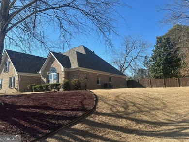 Gorgeous 4-sided brick 5 bedroom, 3.5 bathroom home on almost 1 on Cedar Lake Golf Club in Georgia - for sale on GolfHomes.com, golf home, golf lot