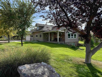 Tucked away on a picturesque lot across from the golf course on Rolling Hills Golf Course in Idaho - for sale on GolfHomes.com, golf home, golf lot