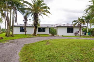 Welcome to this stunning 4-bedroom, 3-bathroom home at 17350 SW on Redland Golf and Country Club in Florida - for sale on GolfHomes.com, golf home, golf lot