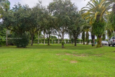 Welcome to this stunning 4-bedroom, 3-bathroom home at 17350 SW on Redland Golf and Country Club in Florida - for sale on GolfHomes.com, golf home, golf lot