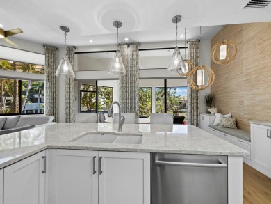 Located behind the gates of the prestigious Bay Isles, this on Longboat Key Golf Club Resort in Florida - for sale on GolfHomes.com, golf home, golf lot