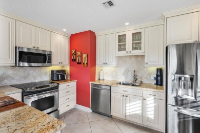 Step into this beautifully updated 2nd floor corner condominium on Quail Ridge Golf Course and Country Club in Florida - for sale on GolfHomes.com, golf home, golf lot