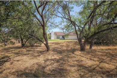 This lot is zone for a duplex so you could build live in one on Slick Rock Golf Course - Horseshoe Bay in Texas - for sale on GolfHomes.com, golf home, golf lot