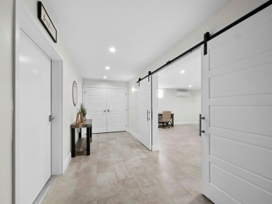 Located behind the gates of the prestigious Bay Isles, this on Longboat Key Golf Club Resort in Florida - for sale on GolfHomes.com, golf home, golf lot