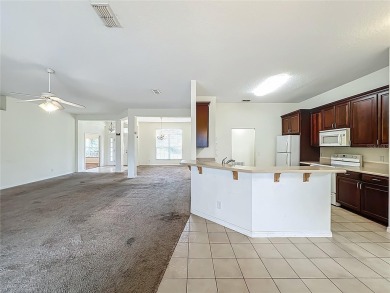 Welcome to 36730 Oconee, a golfer's paradise nestled in the on Black Bear Golf Club in Florida - for sale on GolfHomes.com, golf home, golf lot
